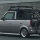 Image for article titled Someone Used A Jeep Wrangler Soft Top And Some Ingenuity To Turn A Scion xB Into A Convertible Pickup